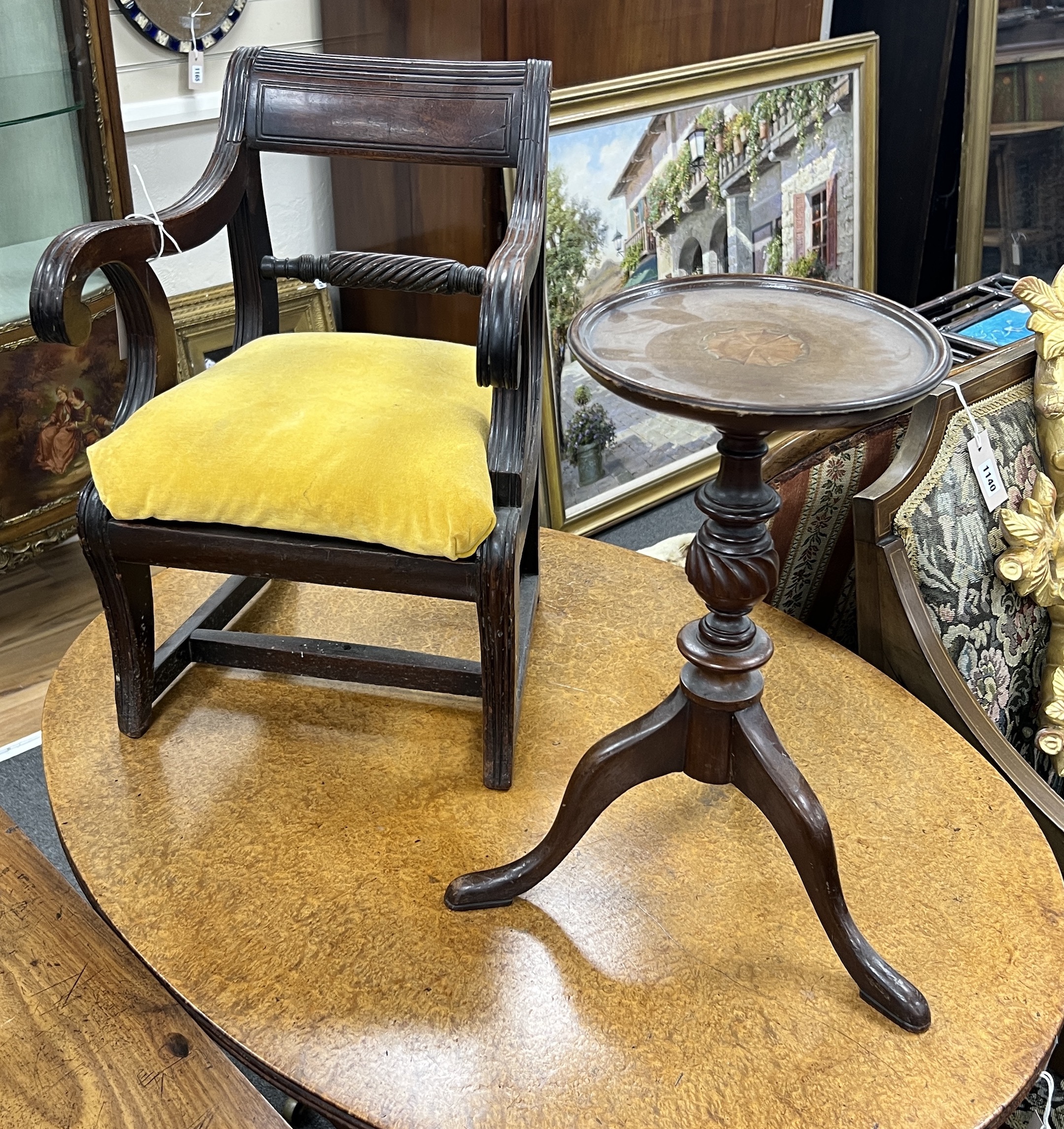 A Regency mahogany child's elbow chair, width 50cm together with an Edwardian inlaid mahogany candle stand